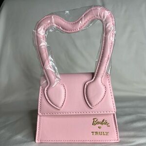 Barbie™ Mini Purse
Limited Edition Pink Bag